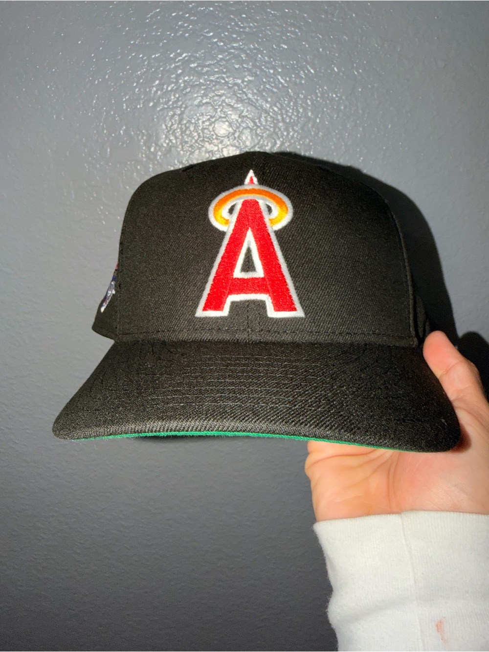New Era Black Baseball Cap with Red & Yellow Angels Logo